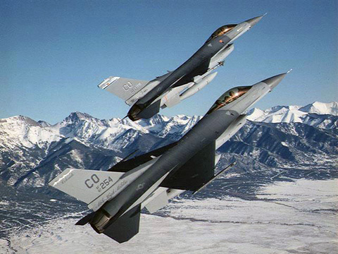 F16 fighter jets flying over mountains of Colorado F16 fighter jets flying over mountains of Colorado